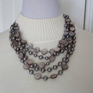 Multi strand metal beads and shell necklace
